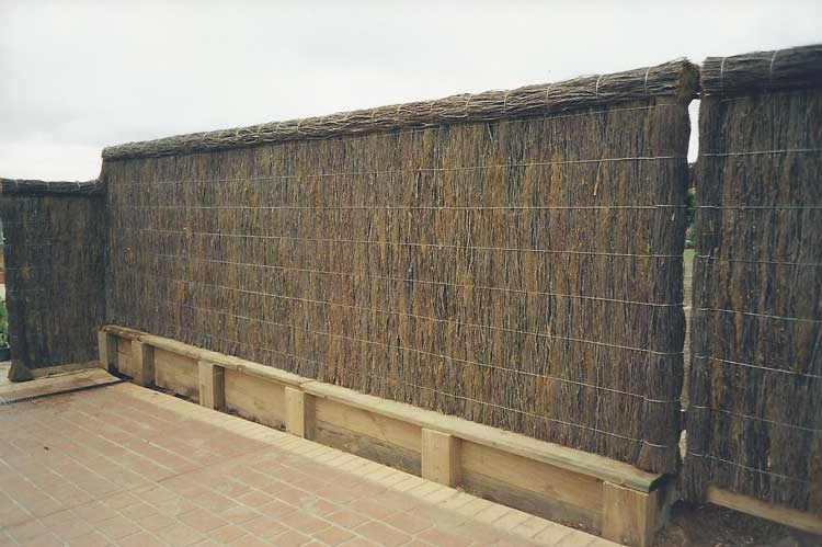 brushwood-fence-with-bricks