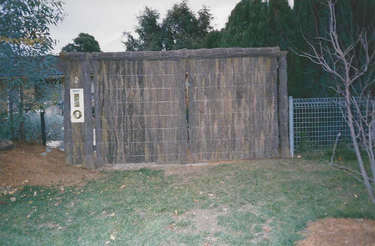 brushwood-fence-with-letter-box