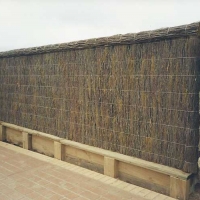 brushwood-fence-with-bricks